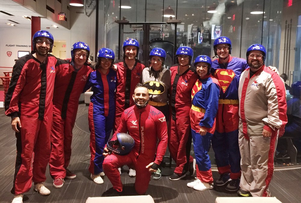 Abilitie employees at an indoor skydiving group activity